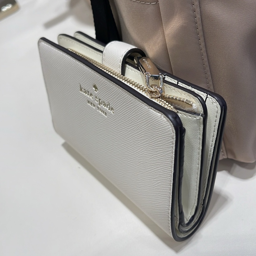 Kate Spade Schuyler Medium Compact Bifold Wallet
Meringue 
NWT - Picture 16 of 16